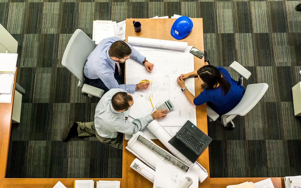 Meeting, business, architect — Ensure Safe Demolition with a Pre-Work Asbestos Survey