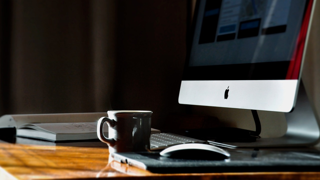 Coffee, cup, desk — Great Hill Community Homes in Austin, Texas